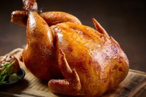 Frango assado inteiro - Canva